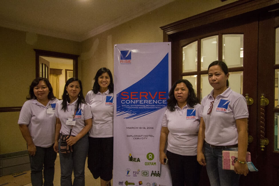 SERVE Conference Secretariat members Ms. Donna Nobleza, Ms. Line Mamburam, Ms. Teresa Ruelas and Ms. Silay Ramos take a break with Ms. Geraldine Labradores, representative of the World Fair Trade Organization-Philippines to the Organizing Committee.
