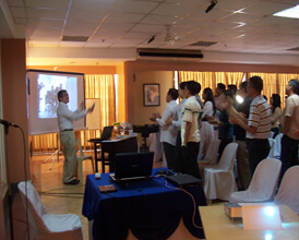 Participants sing “Man in the Mirror”  to begin the Social Marketing Voluntary Change session.