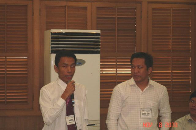 PERFEXCOM-Cambodia Officers Chhorn Sam Ath (right) and Yourng Pakk (left) share the results of their workshop to the plenary.